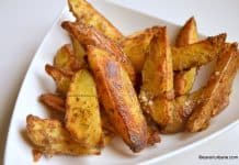 Cartofi la cuptor cu usturoi si parmezan reteta de garlic parmesan wedges Cartofi la cuptor cu usturoi si parmezan reteta de garlic parmesan wedges savori urbane 01