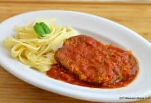 Cotlet de porc cu sos de rosii, vin si usturoi Cotlet de porc cu sos de rosii reteta simpla savori urbane