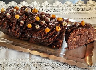 Cozonac Ferrero Rocher cu alune caramelizate, Nutella, ciocolată și lichior Bailey’s Cozonac Ferrero Rocher cu alune caramelizate, Nutella, ciocolată și lichior Bailey's