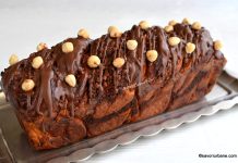 Babka cu Nutella, ciocolată și alune de pădure – rețeta de cozonac despicat și împletit Babka cu Nutella, ciocolată și alune de pădure - rețeta de cozonac despicat și împletit savori urbane